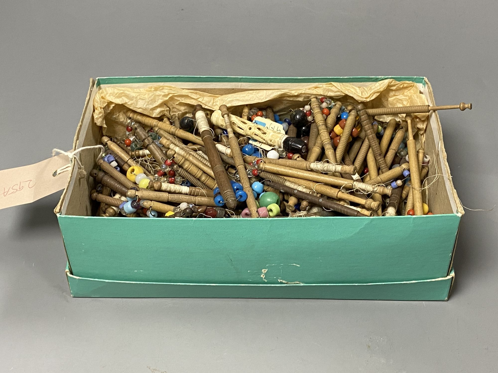 A group of Victorian lacemakers bobbins